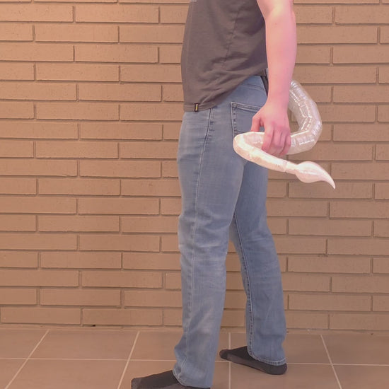 Demonstration of the quick-release belt loop on a Tiefling FlexiTail