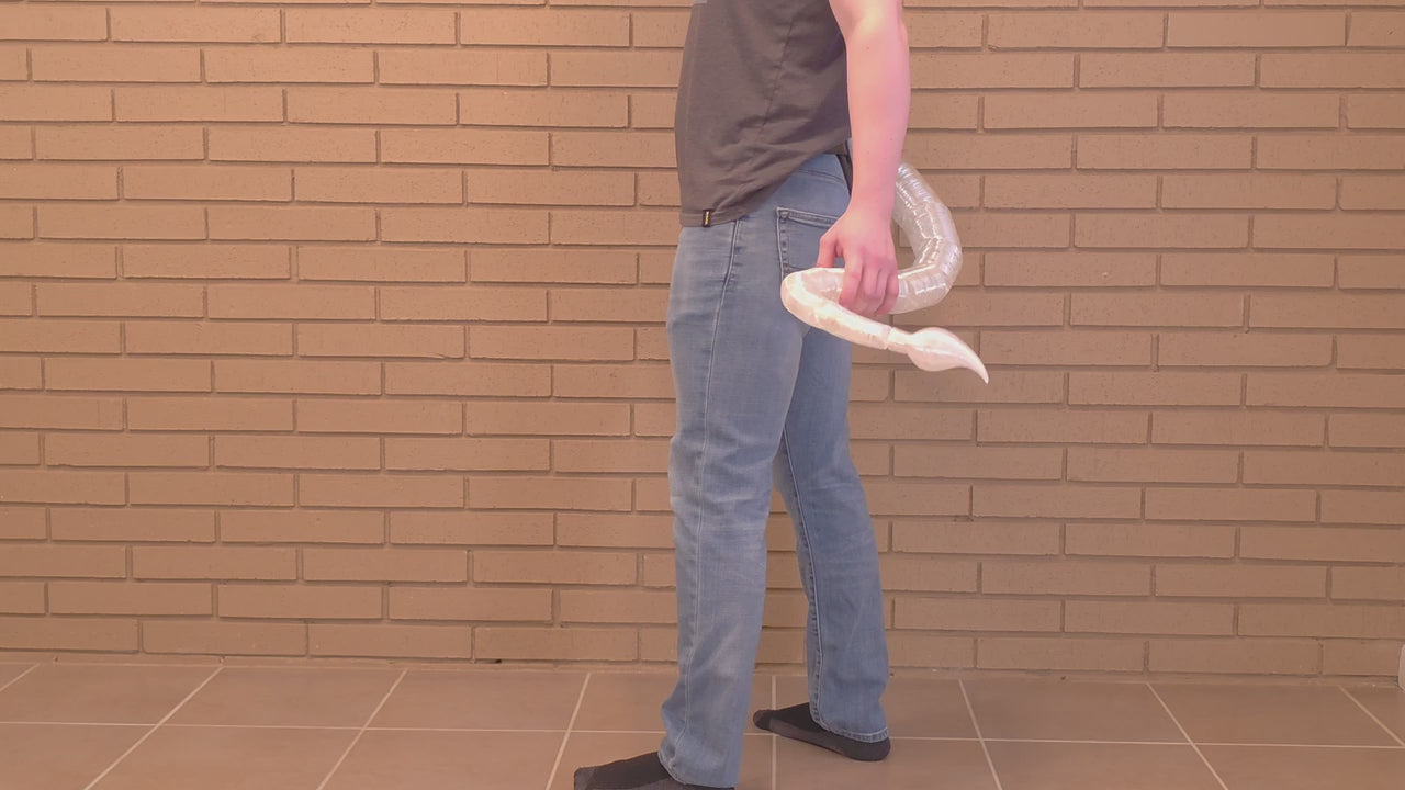 Demonstration of the quick-release belt loop on a Tiefling FlexiTail