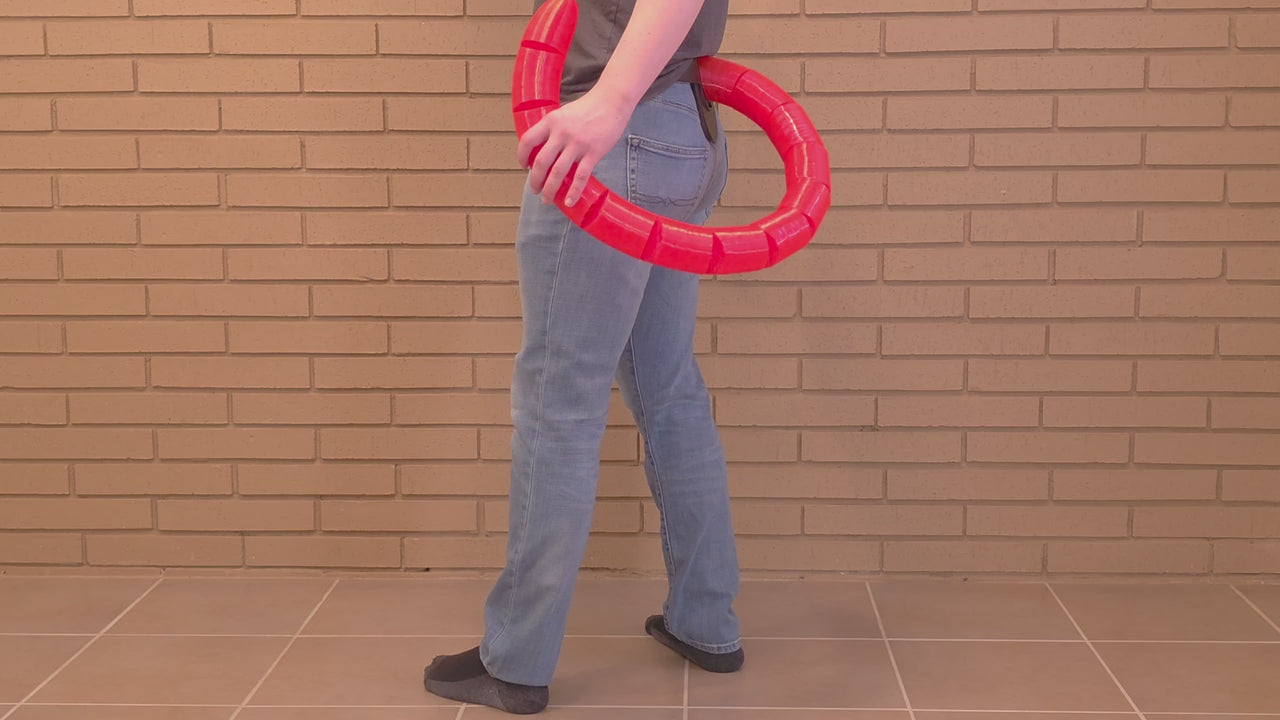 Demonstration of the quick-release belt loop on a Feline FlexiTail