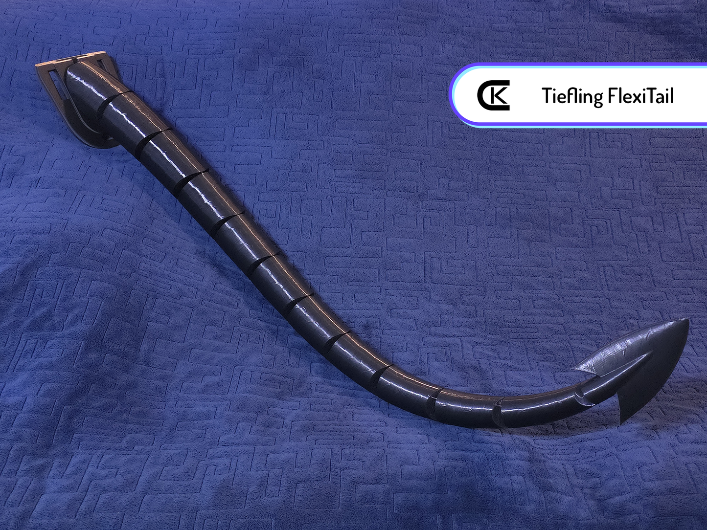 A black Tiefling FlexiTail